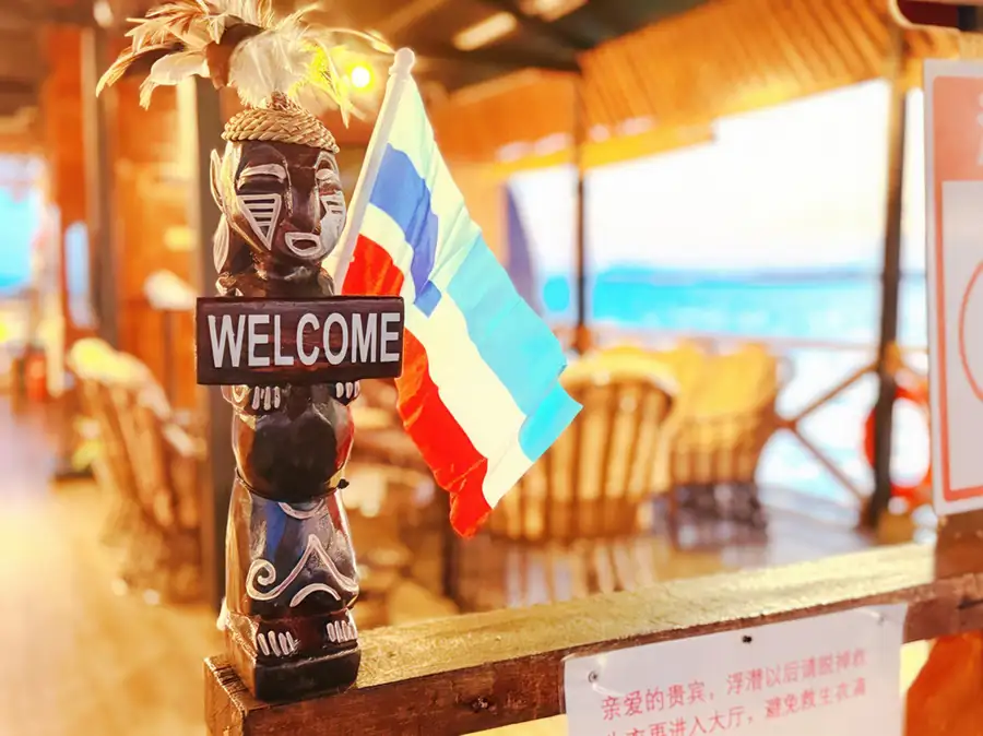 Entrance sign and reception desk at Crystal Resort