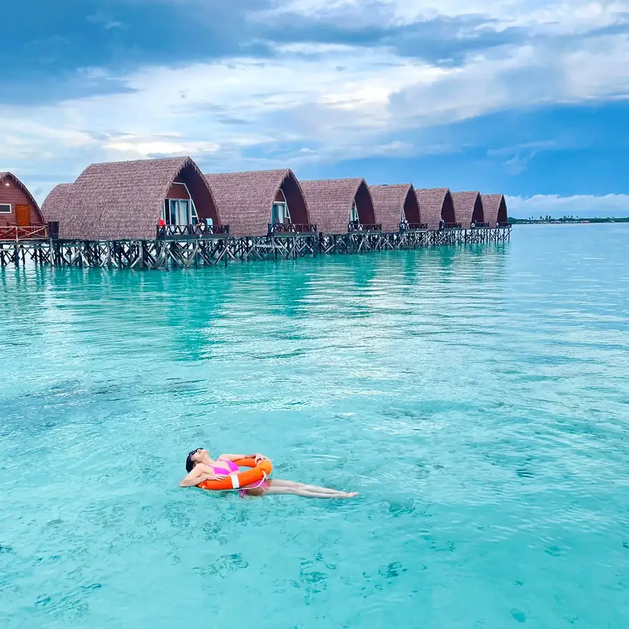 Exterior perspective of the overwater walkways and chalets Crystal Resort
