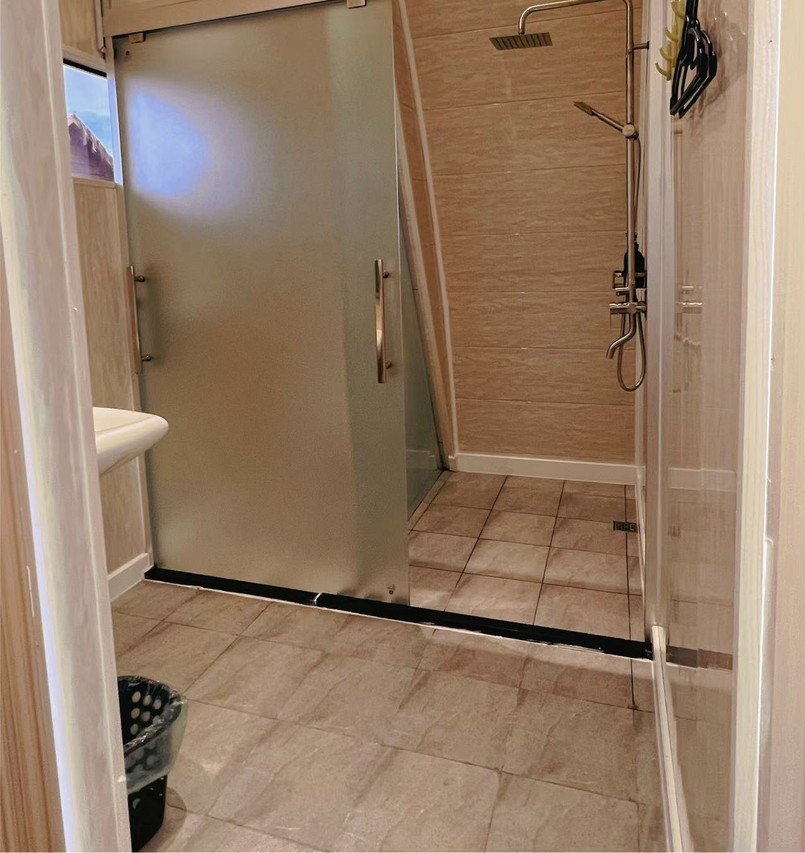 A practical simple bathroom at Crystal Resort, an over the water resort near Semporna