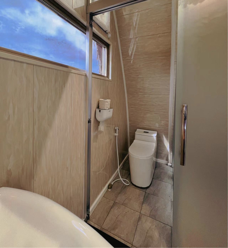 A bright simple bathroom at Crystal Resort, a water resort near the Tun Sakaran Marine Park