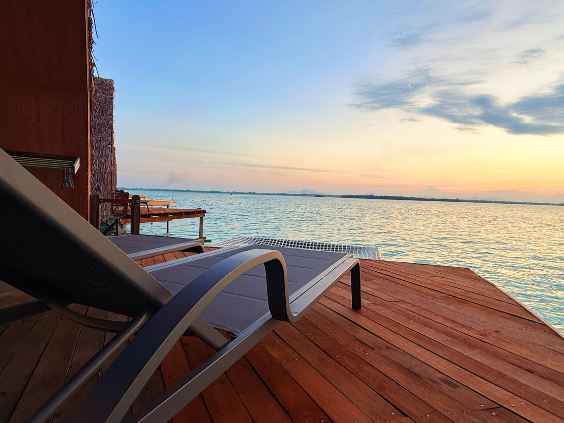 Expansive overwater deck at Crystal Resort, perfectly positioned for Semporna sunsets, an intimate escape suspended between sea and sky